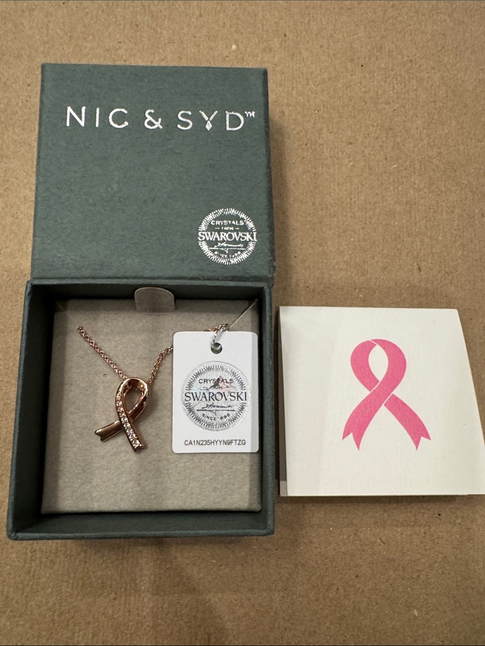 Swarovski Rose Gold Ribbon Pendant Necklace with Pink Crystals